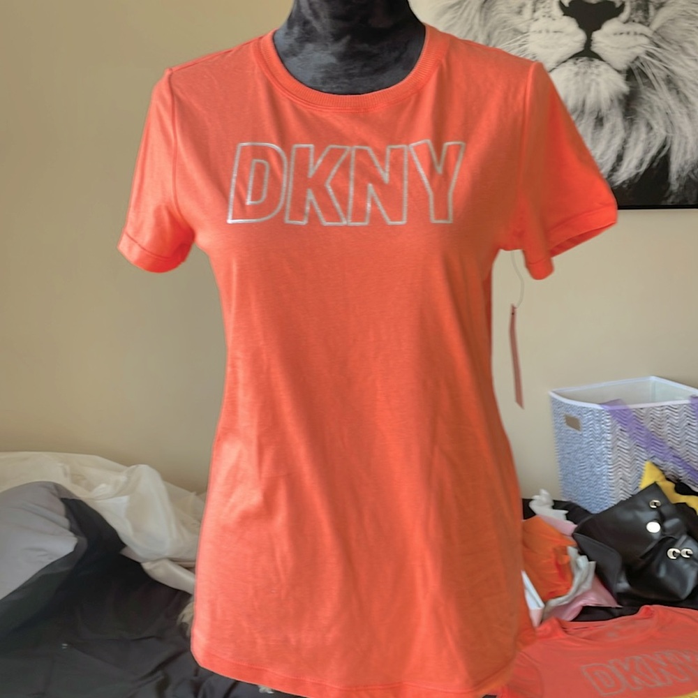 Women’s new with tags DKNY SPORT T-shirt in small and medium